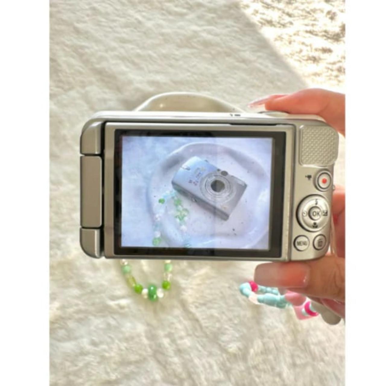 PreOwned Nikon White COOLPIX S6600 Flip Screen Digital Camera